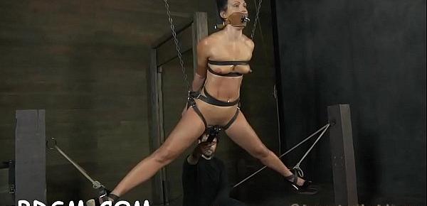  Restrained slave receives lusty torture for her naughty snatch